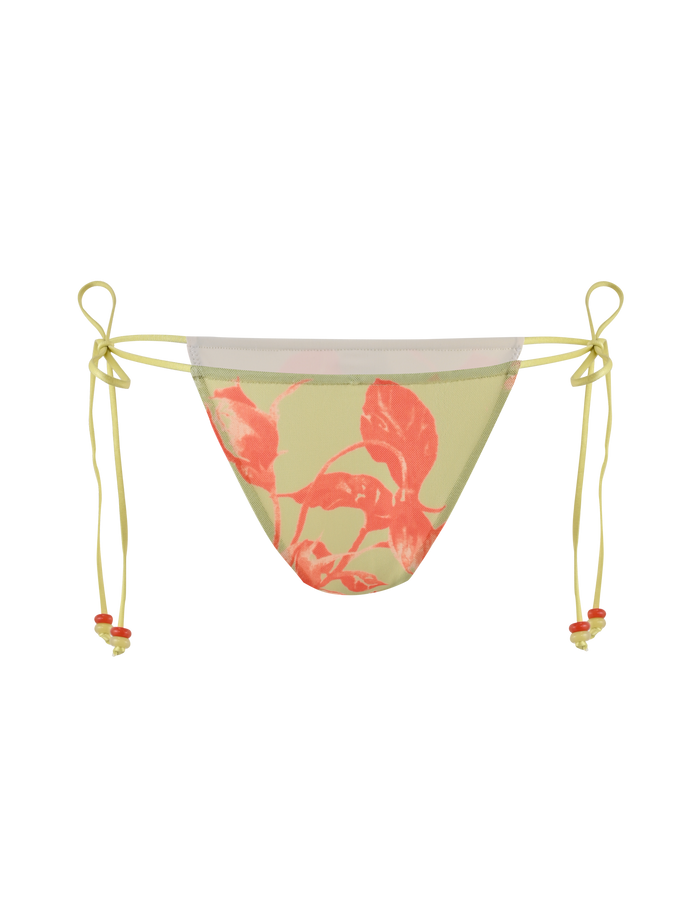 The TIGERMIST AVE 2PC BIKINI BOTTOM - POP FLORAL features a light yellow base with a red-orange leaf print and adjustable side ties detailed with red and yellow beads, offering a playful twist on the classic floral bikini.