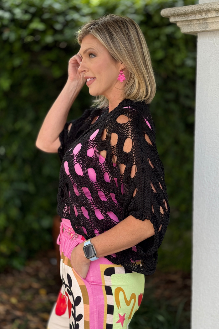 Lightweight Scandal Italy cardigan styled with colorful pants