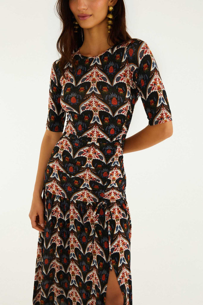 FARM Rio model wearing the Black Porcelain Birds Long Sleeve Slim Maxi Dress
