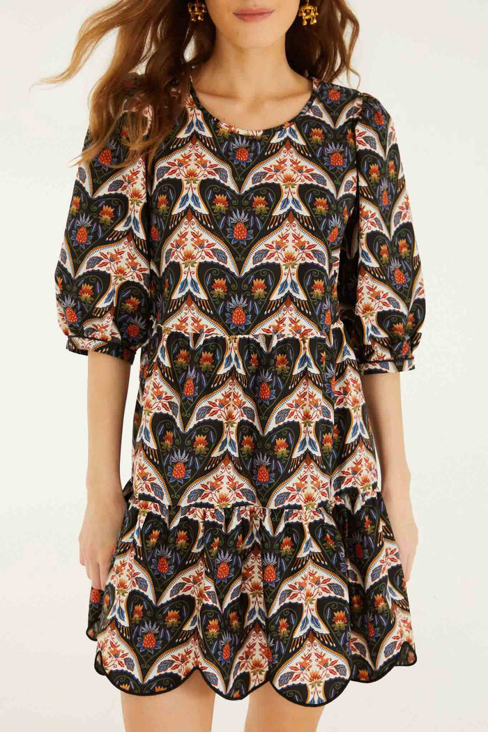 FARM Rio model wearing the Black Porcelain Birds Puff Sleeve Mini Dress