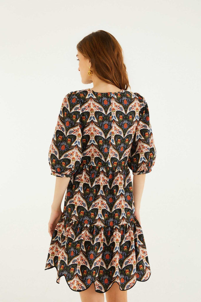FARM Rio model wearing the Black Porcelain Birds Puff Sleeve Mini Dress