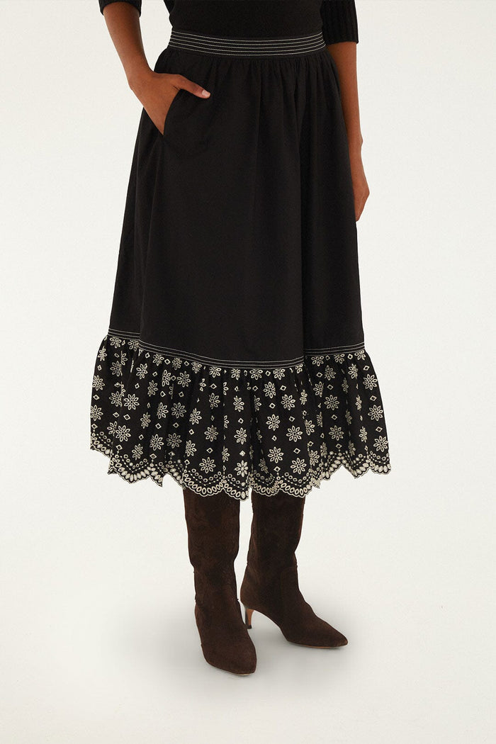FARM Rio model wearing the Black Richelieu Ruffled Midi Skirt