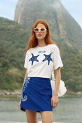 FARM Rio model wearing the Blue Seahorse Embroidery Euroflax Premium Linen Mini Skirt