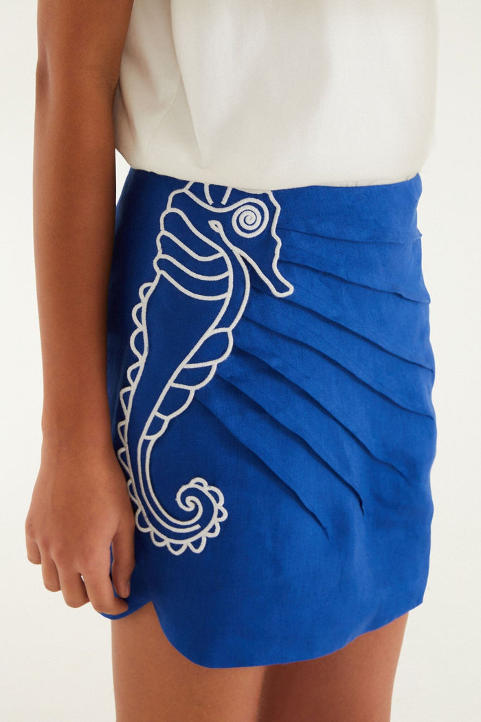 FARM Rio model wearing the Blue Seahorse Embroidery Euroflax Premium Linen Mini Skirt