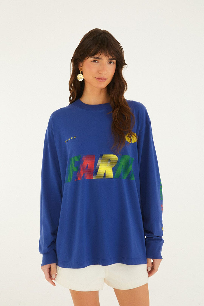 FARM Rio model wearing the Blue Together We Play Long Sleeve T-Shirt