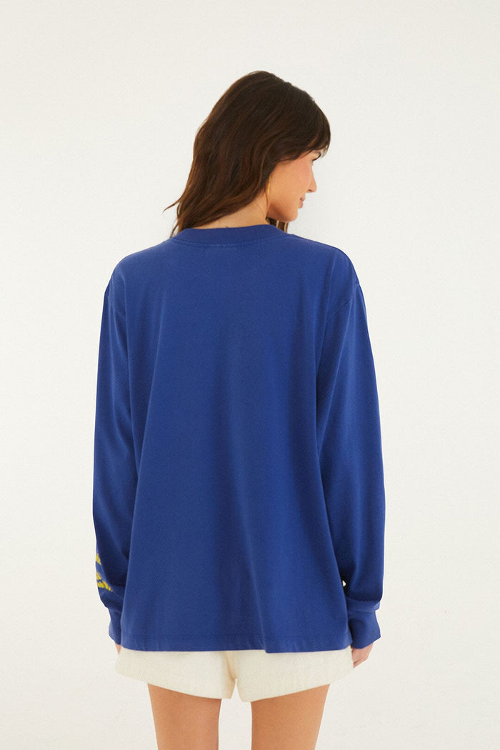FARM Rio model wearing the Blue Together We Play Long Sleeve T-Shirt