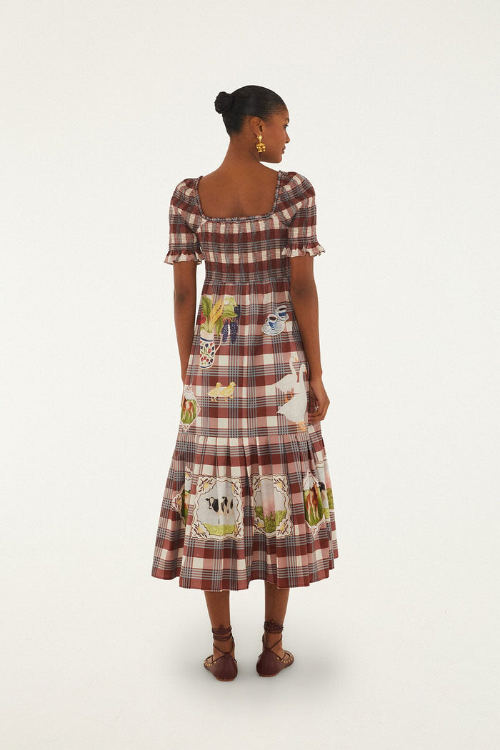 FARM Rio model wearing the Brown Country Table Tartan Smocked Maxi Dress