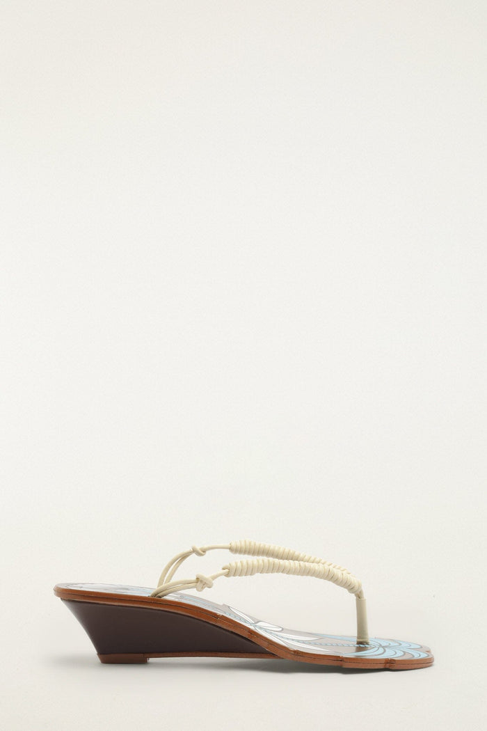 FARM Rio model wearing the Brown Palm Tree Cutwork Wedge Sandal