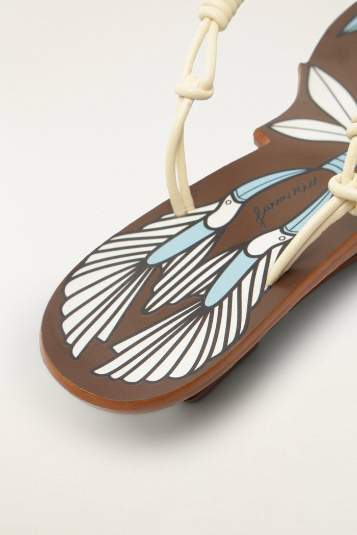 FARM Rio model wearing the Brown Palm Tree Cutwork Wedge Sandal