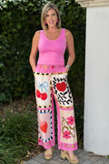 Colorful cherry and patchwork print pants with elastic waist styled with pink tank