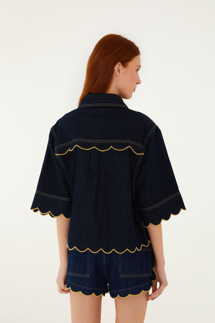 FARM Rio model wearing the Dark Denim Wavy Hem Short Sleeve Shirt