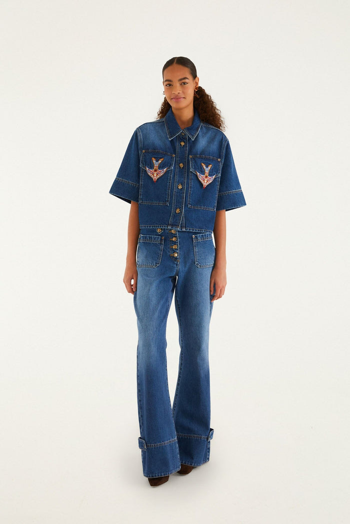 FARM Rio model wearing the Denim Porcelain Birds Embroidered Shirt