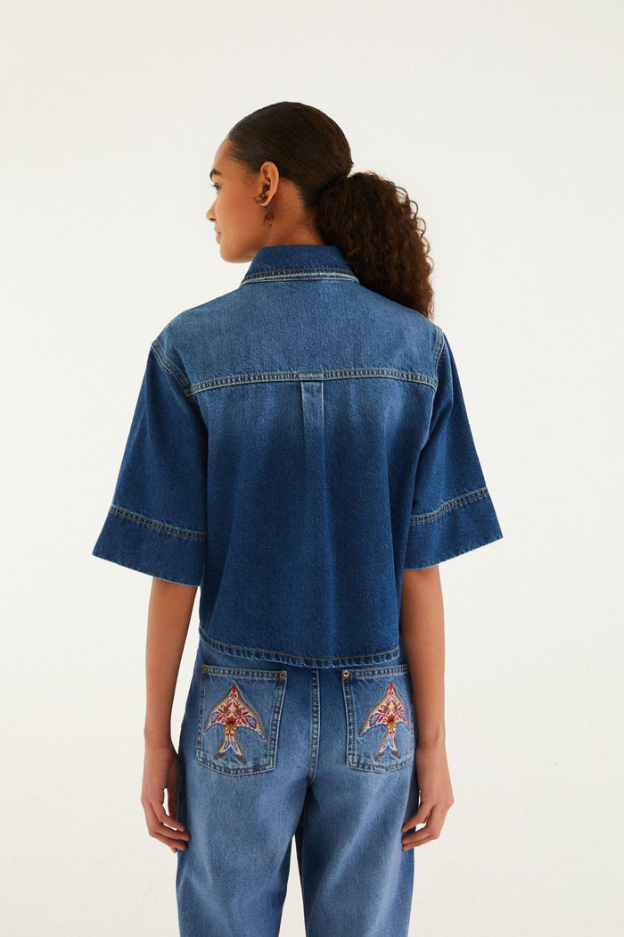 FARM Rio model wearing the Denim Porcelain Birds Embroidered Shirt