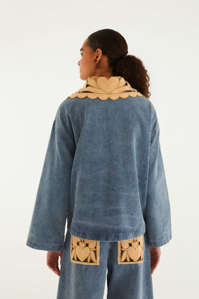FARM Rio model wearing the Denim Richelieu Barn Jacket